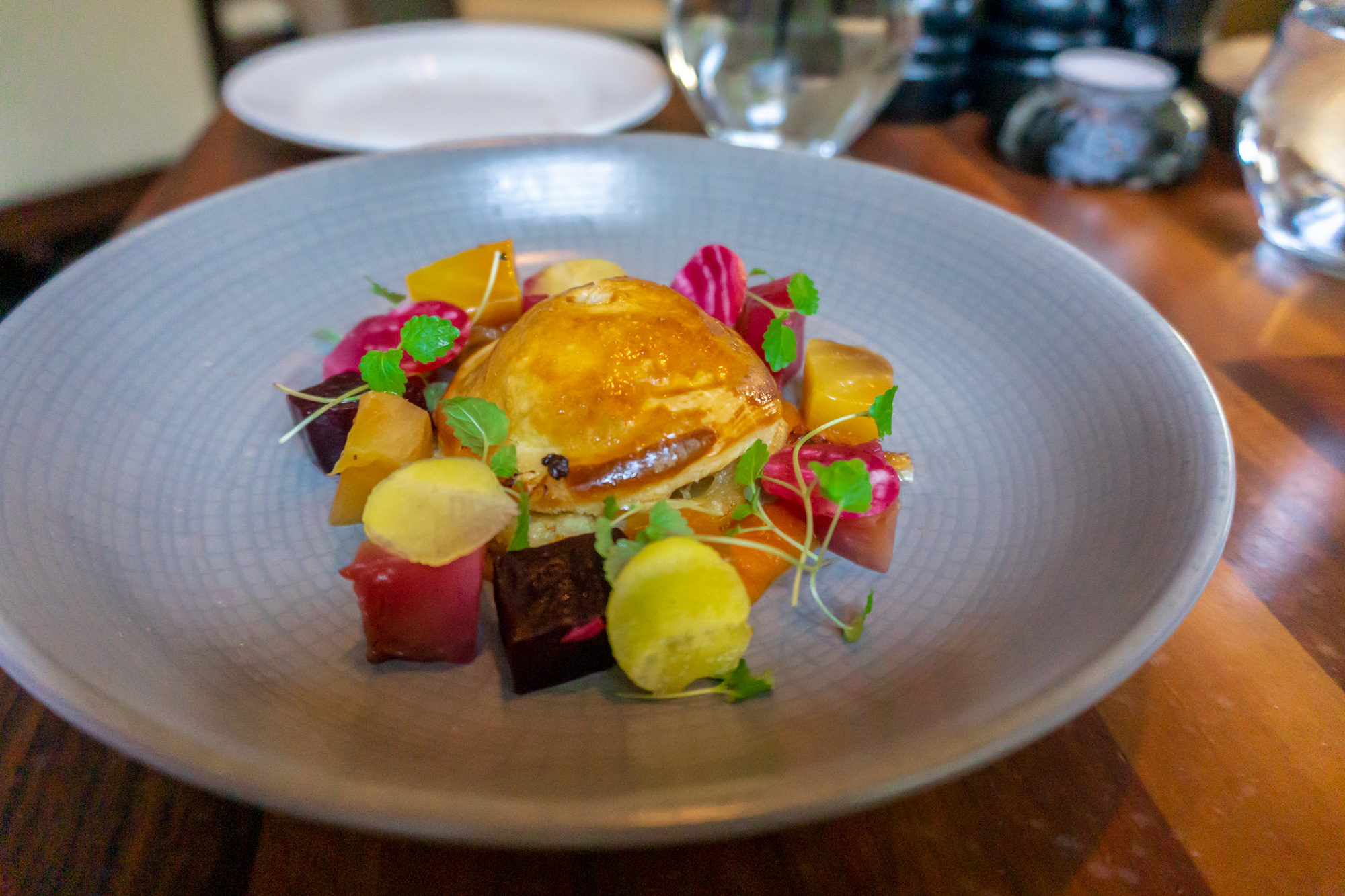 Game pithivier, pumpkin puree, and salted beetroot