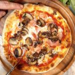 Ham and mushroom pizza