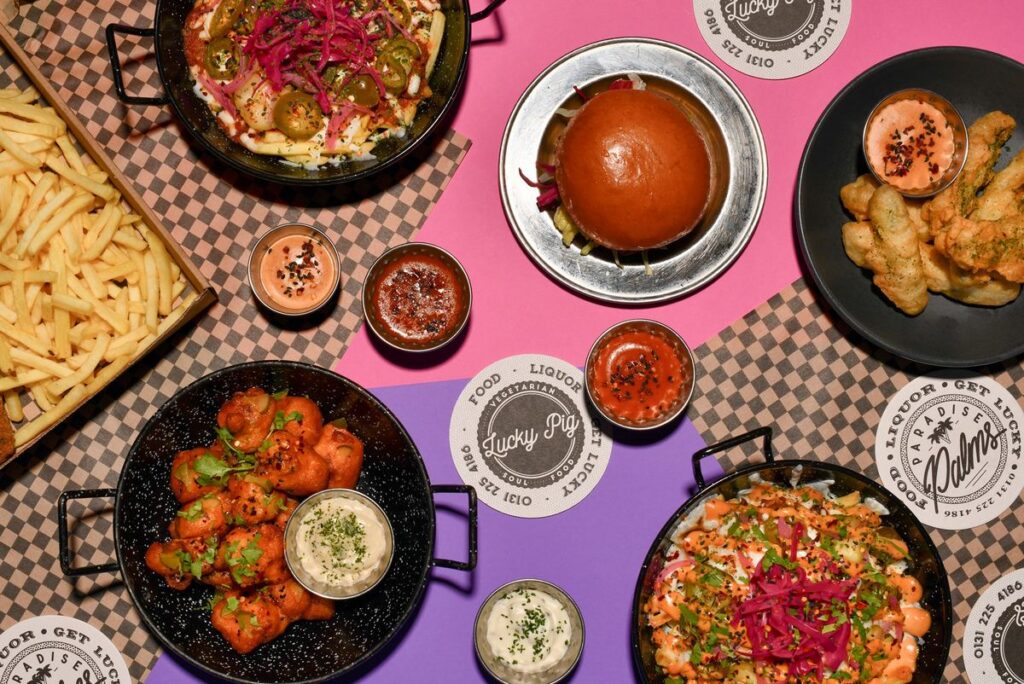 Selection of vegan street food on colourful background