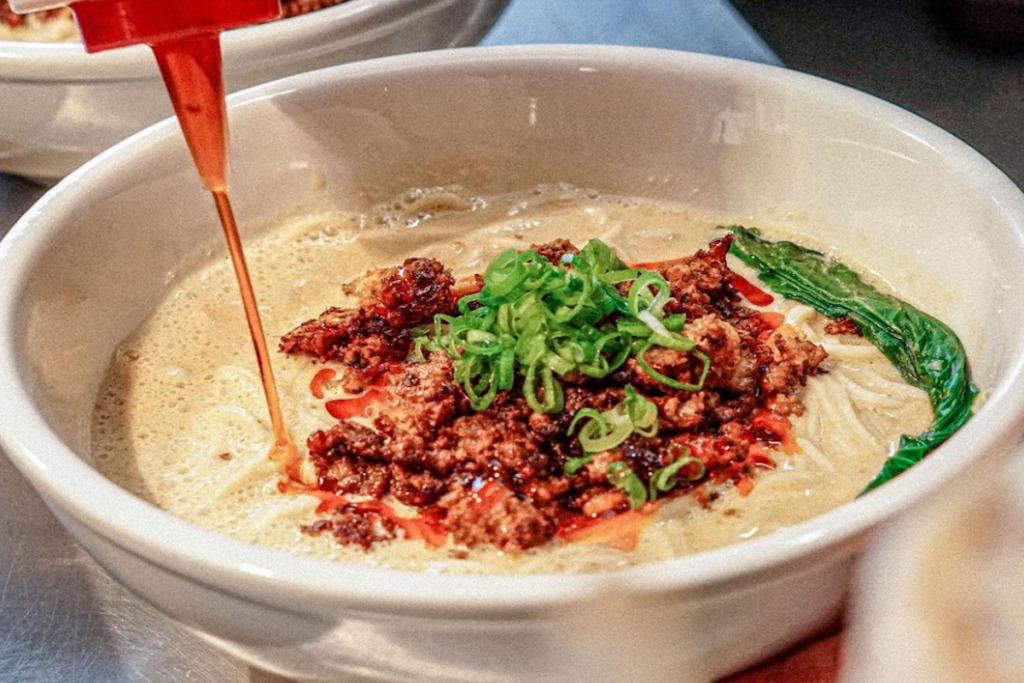 Chinese food with sauce squirted on